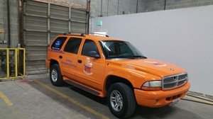 Water Damage Restoration SUV Parked