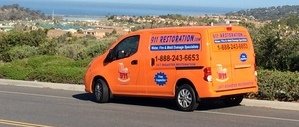 Water Damage Restoration Van Driving To Job Location