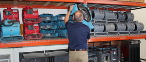 Water Damage Alief Restoration Technician Prepping Air Movers